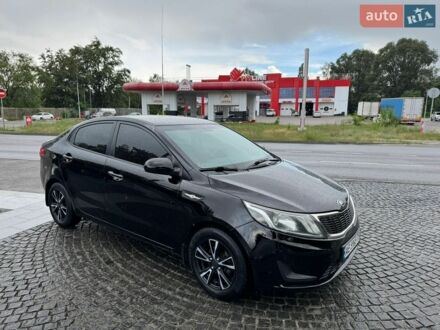 Черный Киа Рио, объемом двигателя 1.4 л и пробегом 106 тыс. км за 7900 $, фото 1 на Automoto.ua