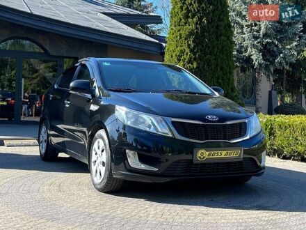 Черный Киа Рио, объемом двигателя 1.4 л и пробегом 215 тыс. км за 6999 $, фото 1 на Automoto.ua