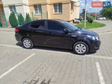 Чорний Кіа Ріо, об'ємом двигуна 1.4 л та пробігом 186 тис. км за 6800 $, фото 1 на Automoto.ua