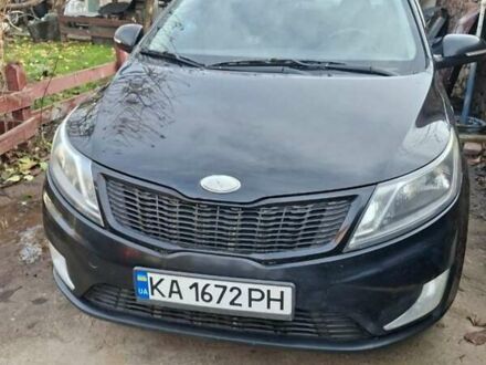 Черный Киа Рио, объемом двигателя 1.59 л и пробегом 320 тыс. км за 6500 $, фото 1 на Automoto.ua