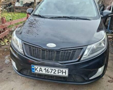 Черный Киа Рио, объемом двигателя 1.59 л и пробегом 320 тыс. км за 6500 $, фото 1 на Automoto.ua