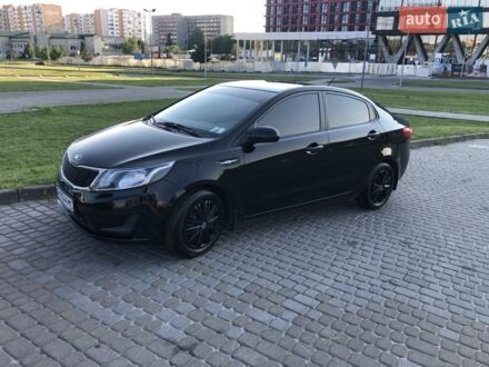 Чорний Кіа Ріо, об'ємом двигуна 1.4 л та пробігом 92 тис. км за 10000 $, фото 1 на Automoto.ua