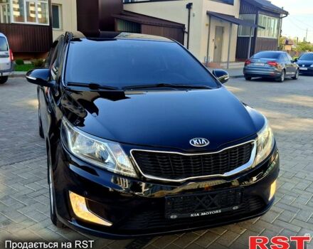 Черный Киа Рио, объемом двигателя 1.6 л и пробегом 130 тыс. км за 8750 $, фото 1 на Automoto.ua