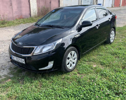 Чорний Кіа Ріо, об'ємом двигуна 1.4 л та пробігом 212 тис. км за 7800 $, фото 1 на Automoto.ua