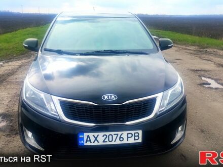 Чорний Кіа Ріо, об'ємом двигуна 1.6 л та пробігом 91 тис. км за 7800 $, фото 1 на Automoto.ua