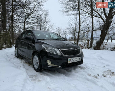 Чорний Кіа Ріо, об'ємом двигуна 1.4 л та пробігом 123 тис. км за 7300 $, фото 1 на Automoto.ua