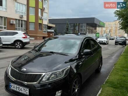 Черный Киа Рио, объемом двигателя 1.4 л и пробегом 128 тыс. км за 9800 $, фото 1 на Automoto.ua
