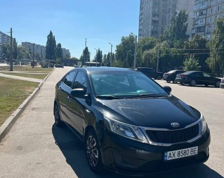 Черный Киа Рио, объемом двигателя 1.4 л и пробегом 200 тыс. км за 6500 $, фото 1 на Automoto.ua