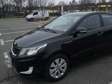 Черный Киа Рио, объемом двигателя 1.6 л и пробегом 150 тыс. км за 9000 $, фото 1 на Automoto.ua