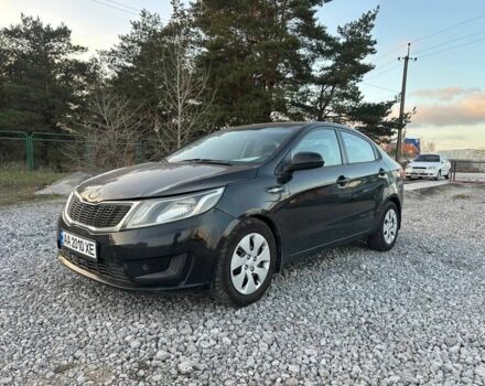 Черный Киа Рио, объемом двигателя 1.4 л и пробегом 199 тыс. км за 5500 $, фото 1 на Automoto.ua