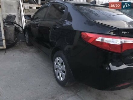Черный Киа Рио, объемом двигателя 1.4 л и пробегом 102 тыс. км за 2870 $, фото 1 на Automoto.ua