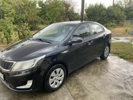 Чорний Кіа Ріо, об'ємом двигуна 1.4 л та пробігом 88 тис. км за 8300 $, фото 1 на Automoto.ua