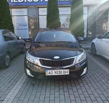 Чорний Кіа Ріо, об'ємом двигуна 1.6 л та пробігом 187 тис. км за 8300 $, фото 1 на Automoto.ua