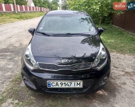 Чорний Кіа Ріо, об'ємом двигуна 1.12 л та пробігом 255 тис. км за 6500 $, фото 1 на Automoto.ua