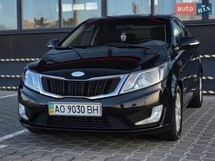 Черный Киа Рио, объемом двигателя 1.6 л и пробегом 192 тыс. км за 6999 $, фото 1 на Automoto.ua