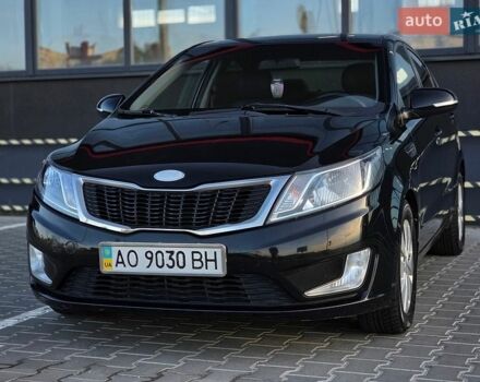 Черный Киа Рио, объемом двигателя 1.6 л и пробегом 192 тыс. км за 6999 $, фото 1 на Automoto.ua