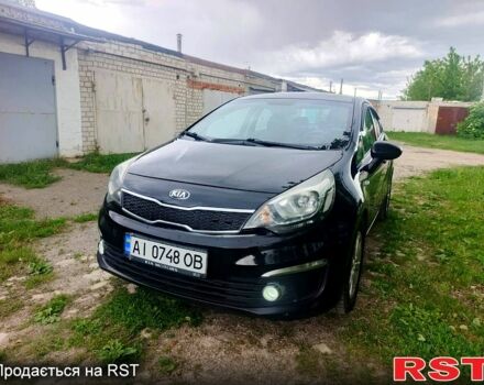 Черный Киа Рио, объемом двигателя 1.4 л и пробегом 179 тыс. км за 6100 $, фото 1 на Automoto.ua