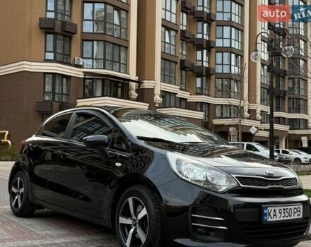 Черный Киа Рио, объемом двигателя 1.4 л и пробегом 74 тыс. км за 12900 $, фото 1 на Automoto.ua