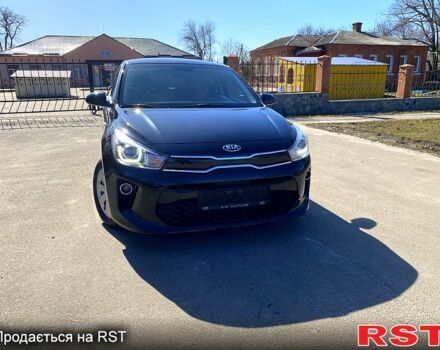 Чорний Кіа Ріо, об'ємом двигуна 1.4 л та пробігом 211 тис. км за 12700 $, фото 1 на Automoto.ua