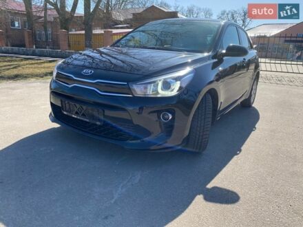 Чорний Кіа Ріо, об'ємом двигуна 1.4 л та пробігом 89 тис. км за 12700 $, фото 1 на Automoto.ua
