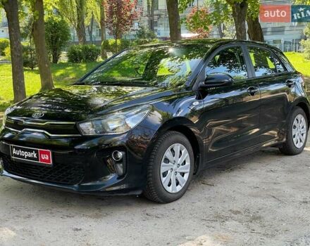 Чорний Кіа Ріо, об'ємом двигуна 1.3 л та пробігом 99 тис. км за 10990 $, фото 1 на Automoto.ua