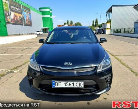 Чорний Кіа Ріо, об'ємом двигуна 1.4 л та пробігом 145 тис. км за 11500 $, фото 1 на Automoto.ua
