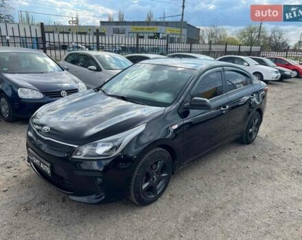 Черный Киа Рио, объемом двигателя 1.37 л и пробегом 145 тыс. км за 12500 $, фото 1 на Automoto.ua