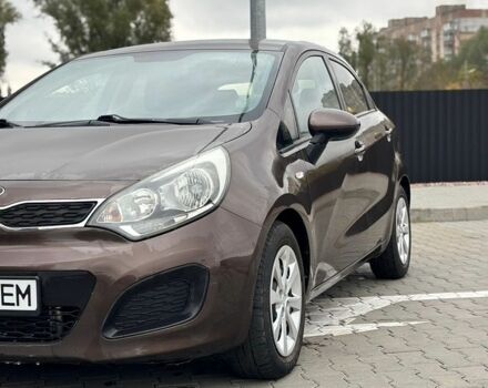 Коричневий Кіа Ріо, об'ємом двигуна 1.12 л та пробігом 298 тис. км за 4900 $, фото 1 на Automoto.ua