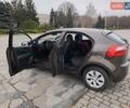 Коричневий Кіа Ріо, об'ємом двигуна 1.25 л та пробігом 238 тис. км за 6900 $, фото 9 на Automoto.ua