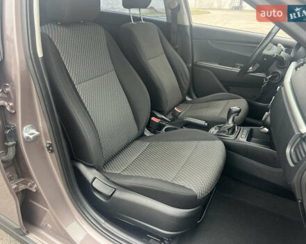 Коричневый Киа Рио, объемом двигателя 1.59 л и пробегом 65 тыс. км за 12800 $, фото 14 на Automoto.ua