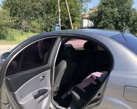 Коричневий Кіа Ріо, об'ємом двигуна 1.4 л та пробігом 270 тис. км за 4200 $, фото 10 на Automoto.ua