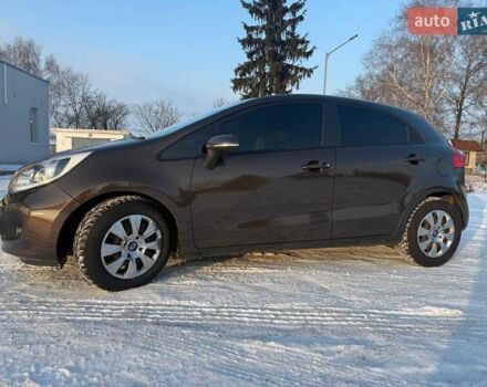 Коричневий Кіа Ріо, об'ємом двигуна 1.4 л та пробігом 171 тис. км за 7950 $, фото 44 на Automoto.ua
