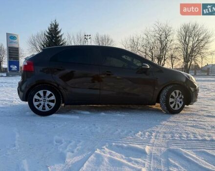 Коричневий Кіа Ріо, об'ємом двигуна 1.4 л та пробігом 171 тис. км за 7950 $, фото 35 на Automoto.ua