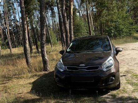 Коричневий Кіа Ріо, об'ємом двигуна 1.4 л та пробігом 180 тис. км за 8500 $, фото 1 на Automoto.ua