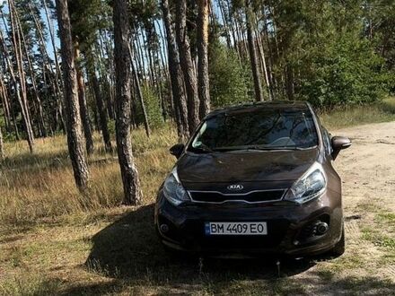 Коричневий Кіа Ріо, об'ємом двигуна 1.4 л та пробігом 180 тис. км за 9100 $, фото 1 на Automoto.ua