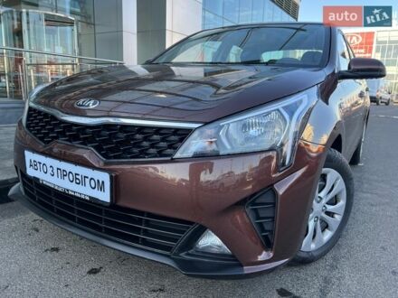 Коричневий Кіа Ріо, об'ємом двигуна 1.59 л та пробігом 59 тис. км за 11469 $, фото 1 на Automoto.ua