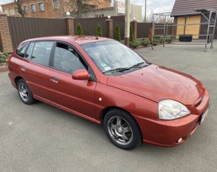 Красный Киа Рио, объемом двигателя 1.4 л и пробегом 270 тыс. км за 3000 $, фото 2 на Automoto.ua