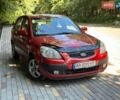 Красный Киа Рио, объемом двигателя 1.6 л и пробегом 152 тыс. км за 4300 $, фото 1 на Automoto.ua