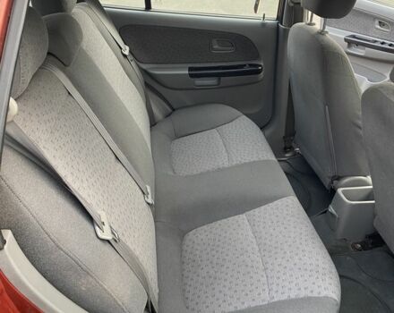 Красный Киа Рио, объемом двигателя 1.4 л и пробегом 270 тыс. км за 3000 $, фото 5 на Automoto.ua