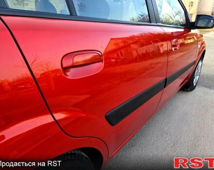 Червоний Кіа Ріо, об'ємом двигуна 1.4 л та пробігом 162 тис. км за 4999 $, фото 6 на Automoto.ua