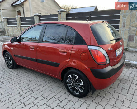 Червоний Кіа Ріо, об'ємом двигуна 1.4 л та пробігом 292 тис. км за 3999 $, фото 9 на Automoto.ua