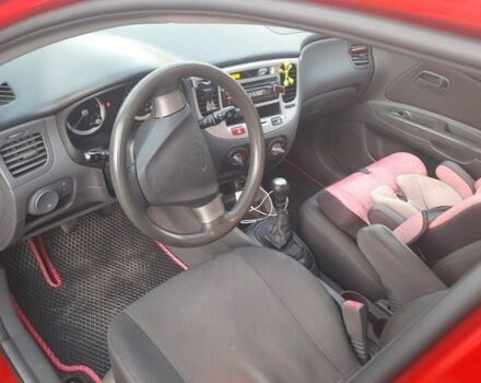 Красный Киа Рио, объемом двигателя 1.5 л и пробегом 263 тыс. км за 3500 $, фото 13 на Automoto.ua