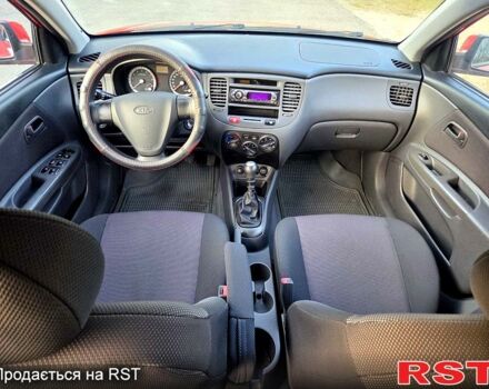Червоний Кіа Ріо, об'ємом двигуна 1.4 л та пробігом 162 тис. км за 4999 $, фото 11 на Automoto.ua