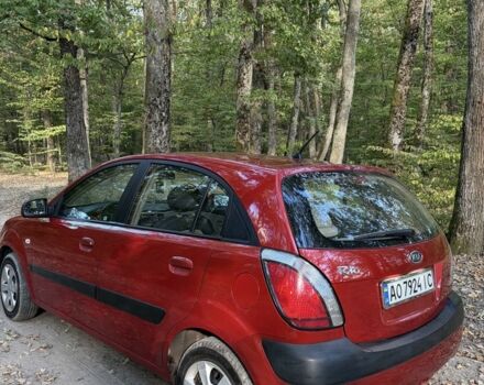 Червоний Кіа Ріо, об'ємом двигуна 1.4 л та пробігом 280 тис. км за 4002 $, фото 3 на Automoto.ua