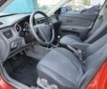 Красный Киа Рио, объемом двигателя 1.4 л и пробегом 280 тыс. км за 3622 $, фото 7 на Automoto.ua