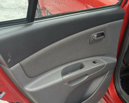 Красный Киа Рио, объемом двигателя 1.4 л и пробегом 110 тыс. км за 5900 $, фото 17 на Automoto.ua