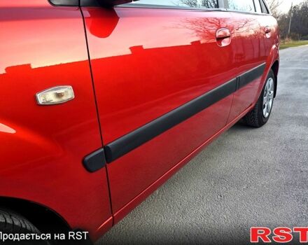 Червоний Кіа Ріо, об'ємом двигуна 1.4 л та пробігом 162 тис. км за 4999 $, фото 1 на Automoto.ua