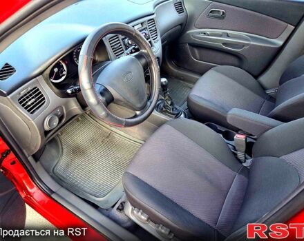 Червоний Кіа Ріо, об'ємом двигуна 1.4 л та пробігом 162 тис. км за 4999 $, фото 12 на Automoto.ua
