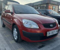 Красный Киа Рио, объемом двигателя 1.4 л и пробегом 246 тыс. км за 5700 $, фото 1 на Automoto.ua