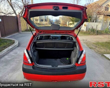 Червоний Кіа Ріо, об'ємом двигуна 1.4 л та пробігом 162 тис. км за 4999 $, фото 13 на Automoto.ua